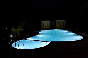 Outdoor pool, open 6:00 AM to 6:00 PM, pool umbrellas - Corbett Wild Resort - A River Access Property (Ramnagar)