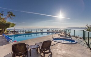 Outdoor pool - Oceanfront Condo: Your Getaway by the Sea (Ladysmith)