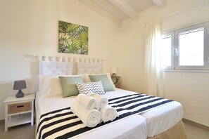 2 habitaciones, tabla de planchar con plancha, cuna de viaje y wifi 