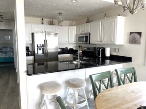 Enjoy casual dining at the kitchen island with seating for two.