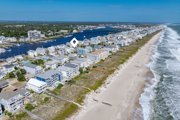 A coastal residential area with beachfront properties, a marina, and a beach. - 710 Canal Upper - Make Everyday a Holiday! (Carolina Beach)