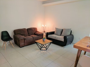 Departamento, 1 habitación | Área de sala de estar