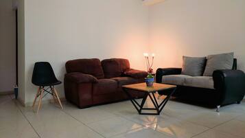 Departamento, 1 habitación | Área de sala de estar