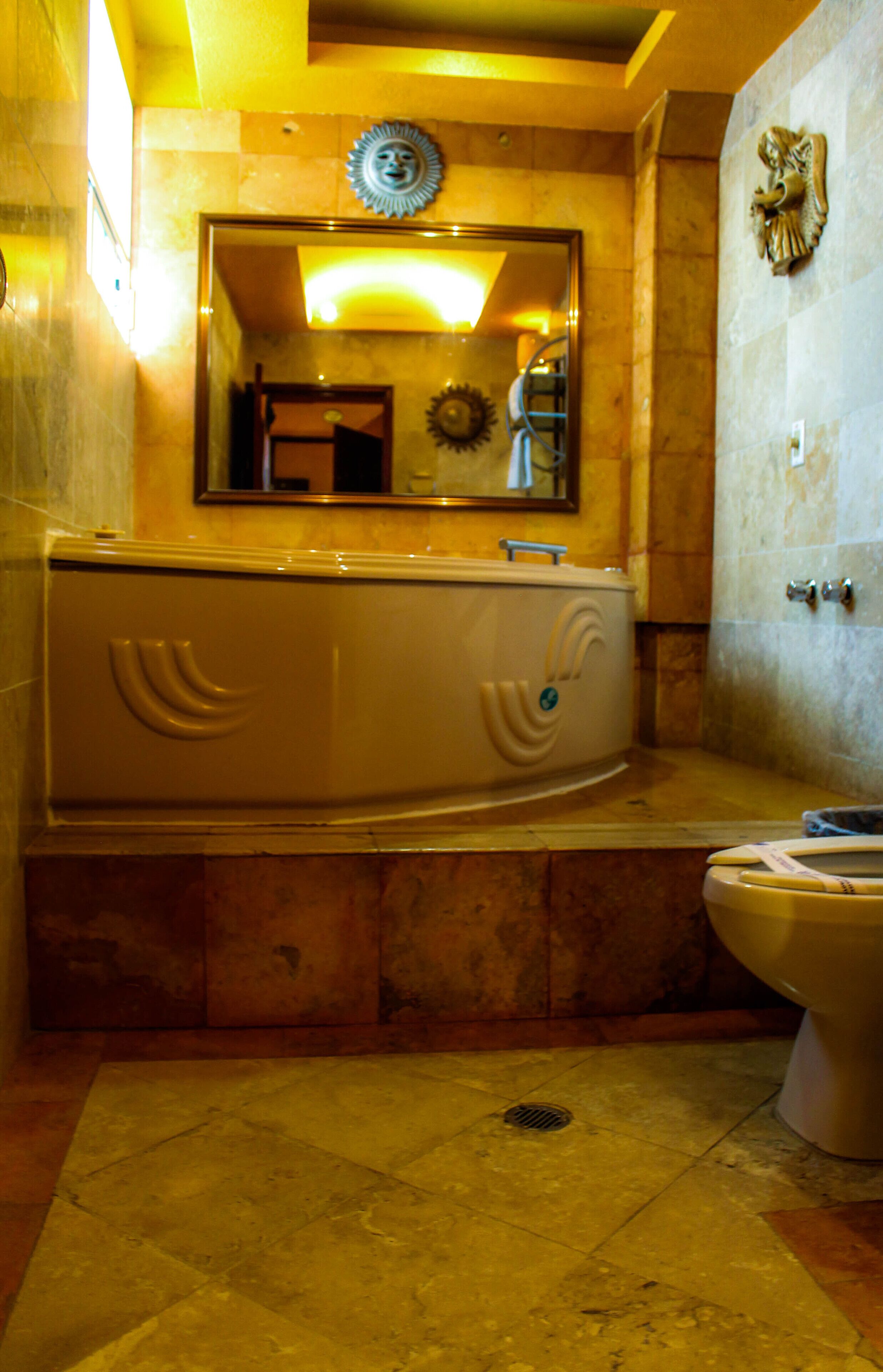 Shower, jetted tub, hair dryer, towels