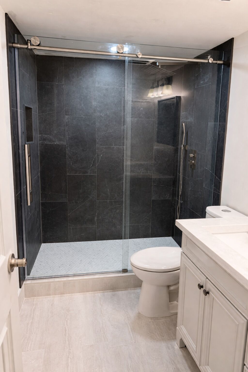 Combined shower/tub, hair dryer, towels, soap