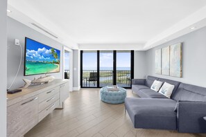 Condo, 1 King Bed with Sofa bed (Elegant beachfront condo in private c) | Living area | Flat-screen TV - Elegant Beachfront Condo in Private Community (Marco Island)