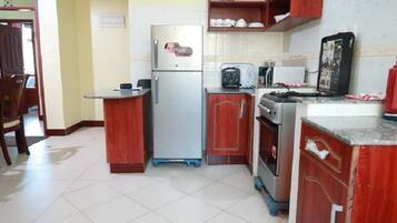 Fridge, coffee/tea maker, electric kettle, paper towels
