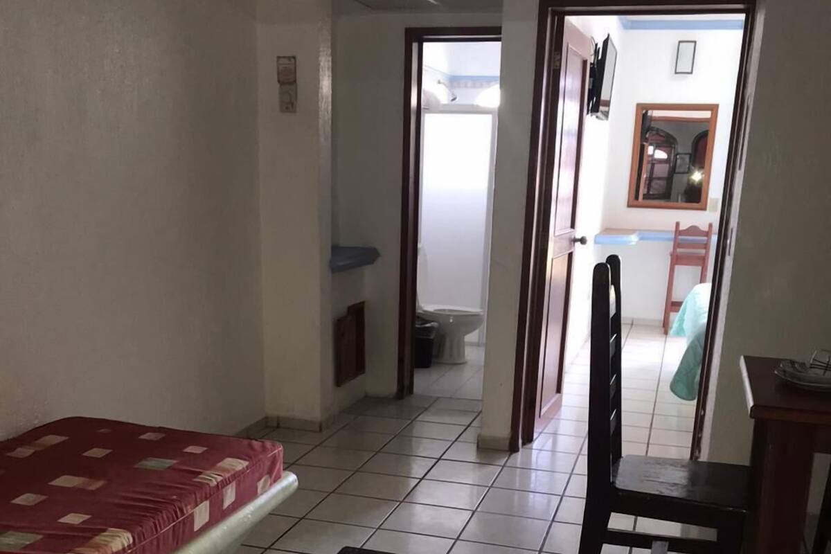 Junior Room | Iron/ironing board (on request), bed sheets
