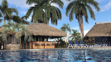 Outdoor pool, pool umbrellas, sun loungers