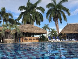 Outdoor pool, open 7:30 AM to 7:00 PM, pool umbrellas, sun loungers