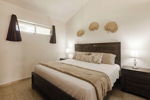 Deluxe Apartment, 1 King Bed, Pool View | Hypo-allergenic bedding available, blackout drapes, soundproofing