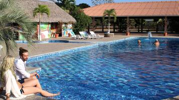 Outdoor pool, pool umbrellas, pool loungers