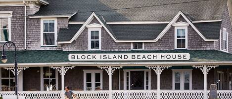 A two-story building with a sign reading "Block Island Beach House."