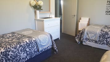 Premium bedding, blackout drapes, free WiFi, bed sheets