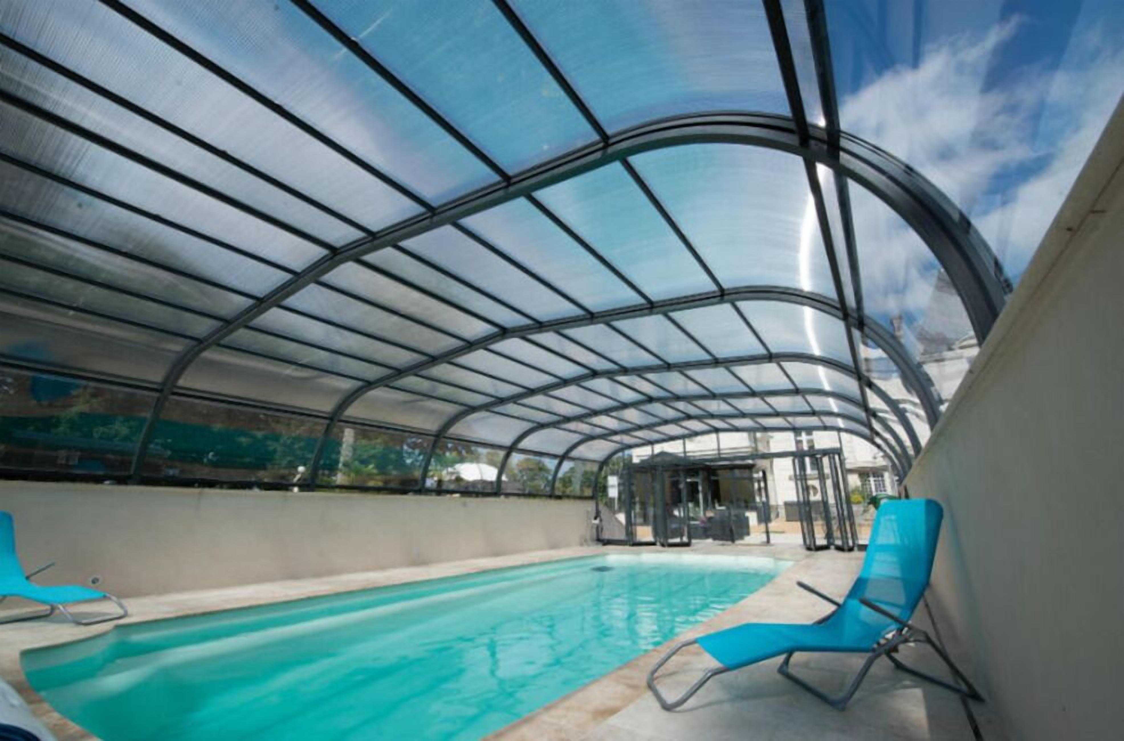 Seasonal outdoor pool, pool loungers