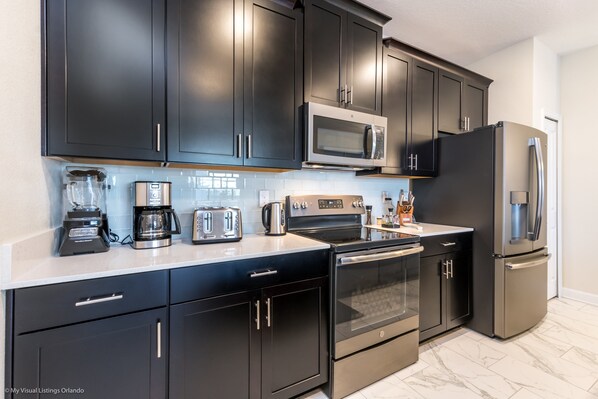 Townhome, 4 Bedrooms | Private kitchen
