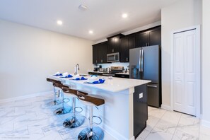 Townhome, 4 Bedrooms | Private kitchen