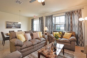 Townhome, 4 Bedrooms | Living area | Flat-screen TV, DVD player
