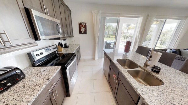 House, 5 Bedrooms | Private kitchen - Encore Resort at Reunion 7705 (Kissimmee)