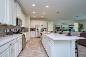 House, Multiple Beds | Private kitchen