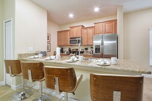 Townhome, 5 Bedrooms | Private kitchen | Highchair