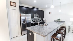 Townhome, 4 Bedrooms | Private kitchen