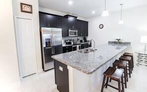 Townhome, 4 Bedrooms | Private kitchen