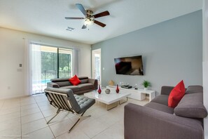 Villa, Multiple Beds | Living area | TV