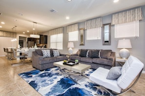 House, 5 Bedrooms | Living area | Flat-screen TV