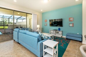 Townhome, 5 Bedrooms | Living area | LCD TV, fireplace, video-game console - Windsor at Westside 8810 (Kissimmee)