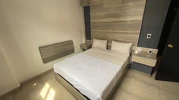 Desk, blackout drapes, soundproofing, bed sheets