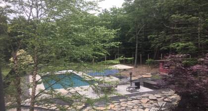 Well-lit apartment. Overlook fields & woods. Near music, dining, cafes, hiking