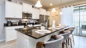 House, 5 Bedrooms | Private kitchen | Microwave, dishwasher - Windsor at Westside 9009 (Kissimmee)