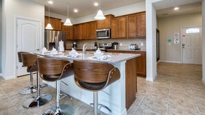 Townhome, 5 Bedrooms | Private kitchen - Windsor at Westside 8802 (Kissimmee)
