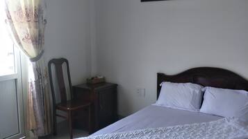 Desk, free WiFi, bed sheets