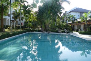 2 outdoor pools, open 8:00 AM to 8:00 PM, pool umbrellas, pool loungers