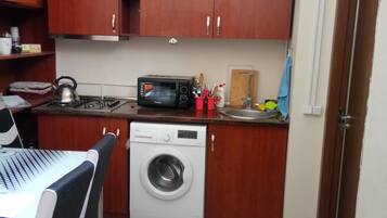 Comfort Double Room, City View | Private kitchen | Fridge, microwave, oven, cookware/dishes/utensils