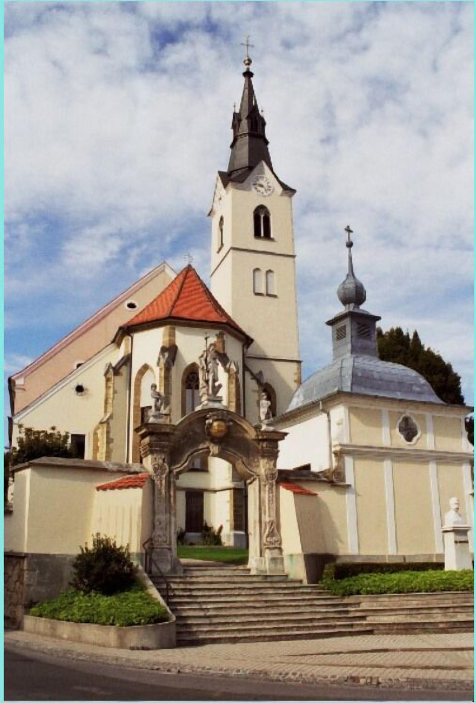 A church with a prominent bell tower and a dome.
