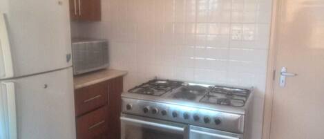 Apartment, 3 Bedrooms | Dapur peribadi | Peti sejuk, ketuhar gelombang mikro, ketuhar, dapur