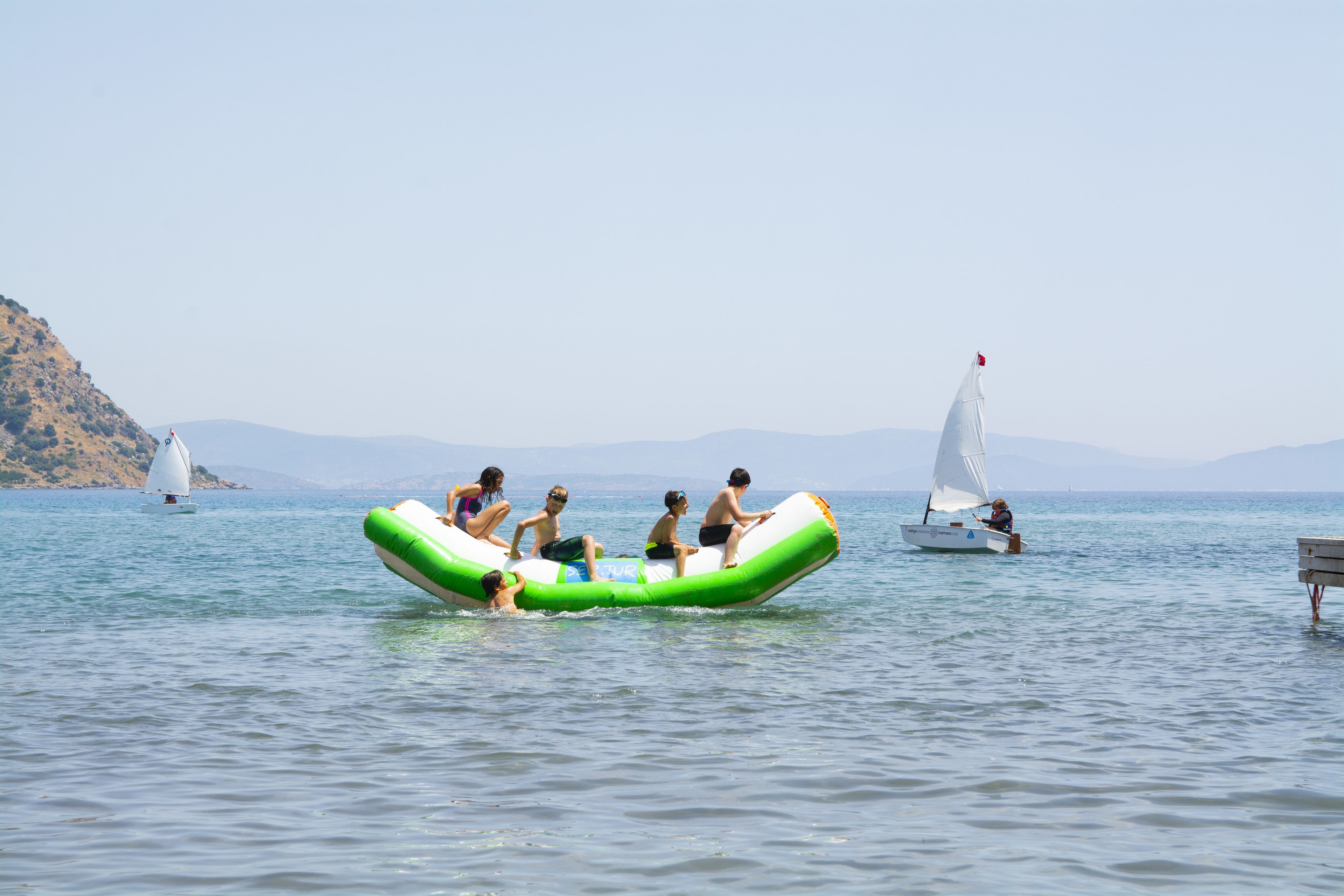 on the beach, beach shuttle, sun-loungers, beach umbrellas