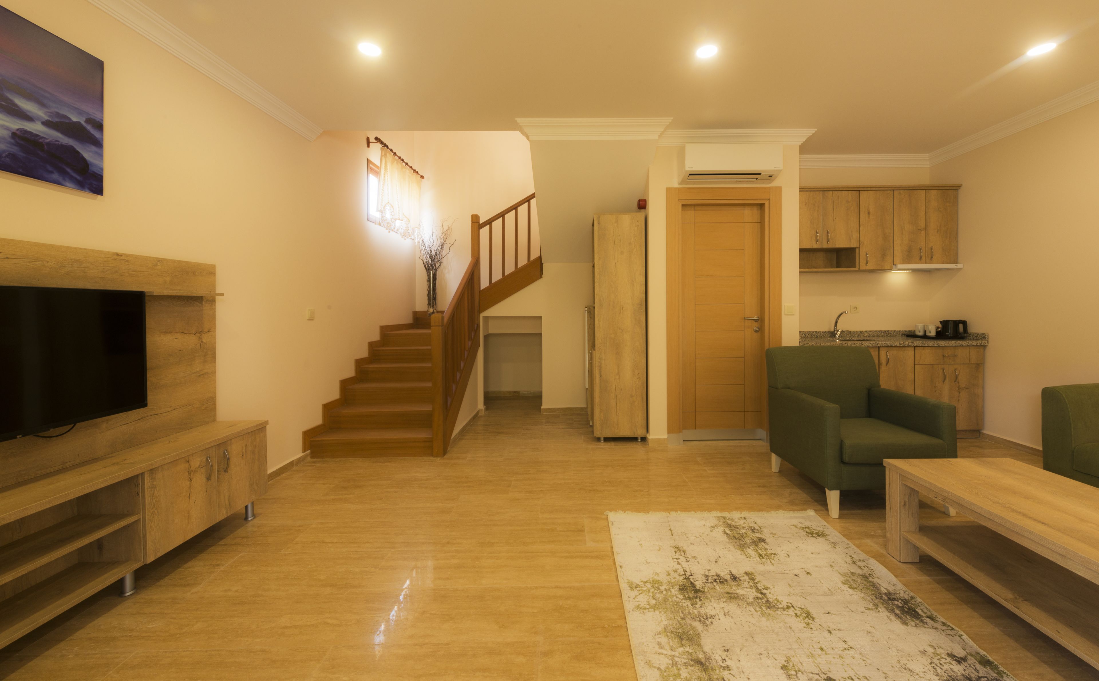 duplex suite | living area | lcd tv, toys, books