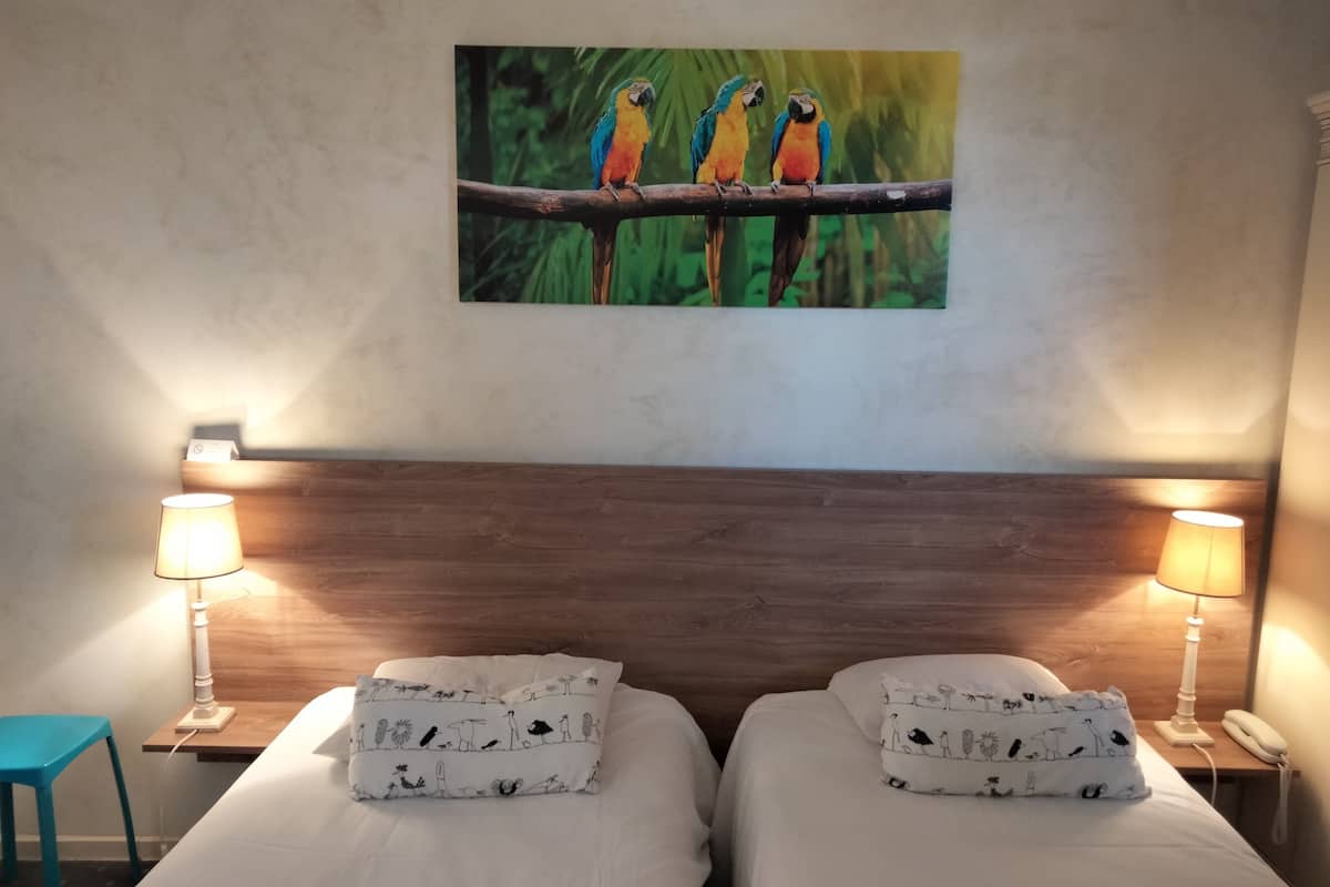 double room | individually decorated, individually furnished, desk, blackout curtains