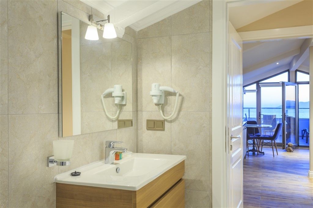 penthouse, sea view | bathroom | designer toiletries, hair dryer, slippers, towels