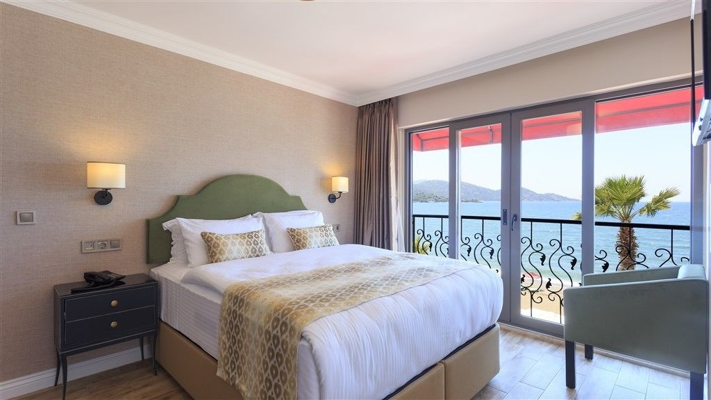 panoramic room, sea view | 1 bedroom, in-room safe, desk, iron/ironing board