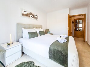 1 habitación, tabla de planchar con plancha, wifi gratis y ropa de cama 