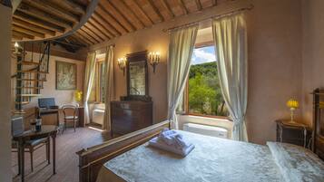 Superior Quadruple Room, Garden View | 1 bedroom, in-room safe, desk, blackout drapes