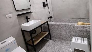 Shower, free toiletries, hair dryer, slippers