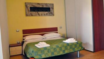 Comfort Apartment, Partial Sea View | Egyptian cotton sheets, premium bedding, pillowtop beds, blackout drapes