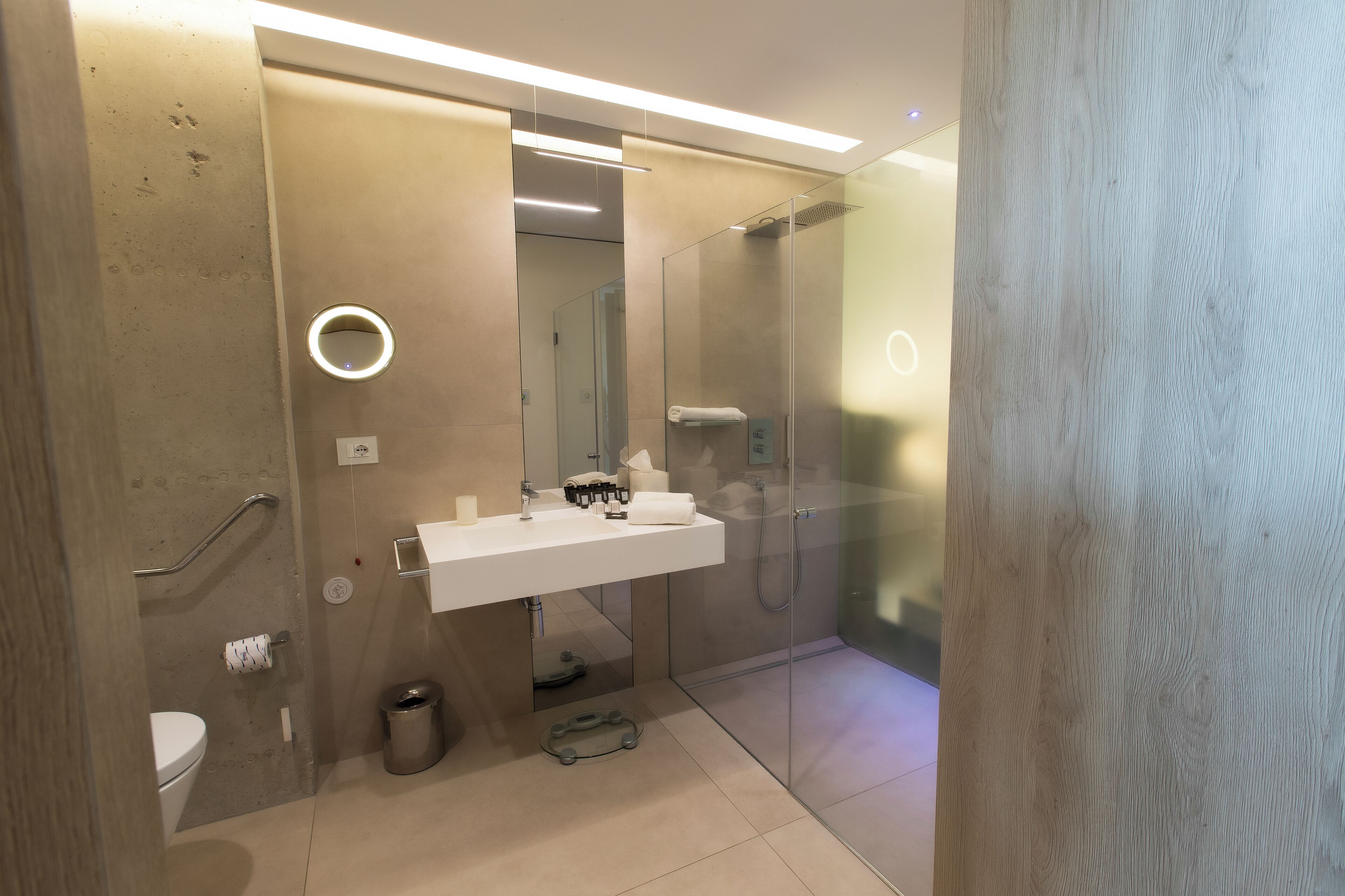 superior suite | bathroom | shower, rainfall showerhead, eco-friendly toiletries, hair dryer