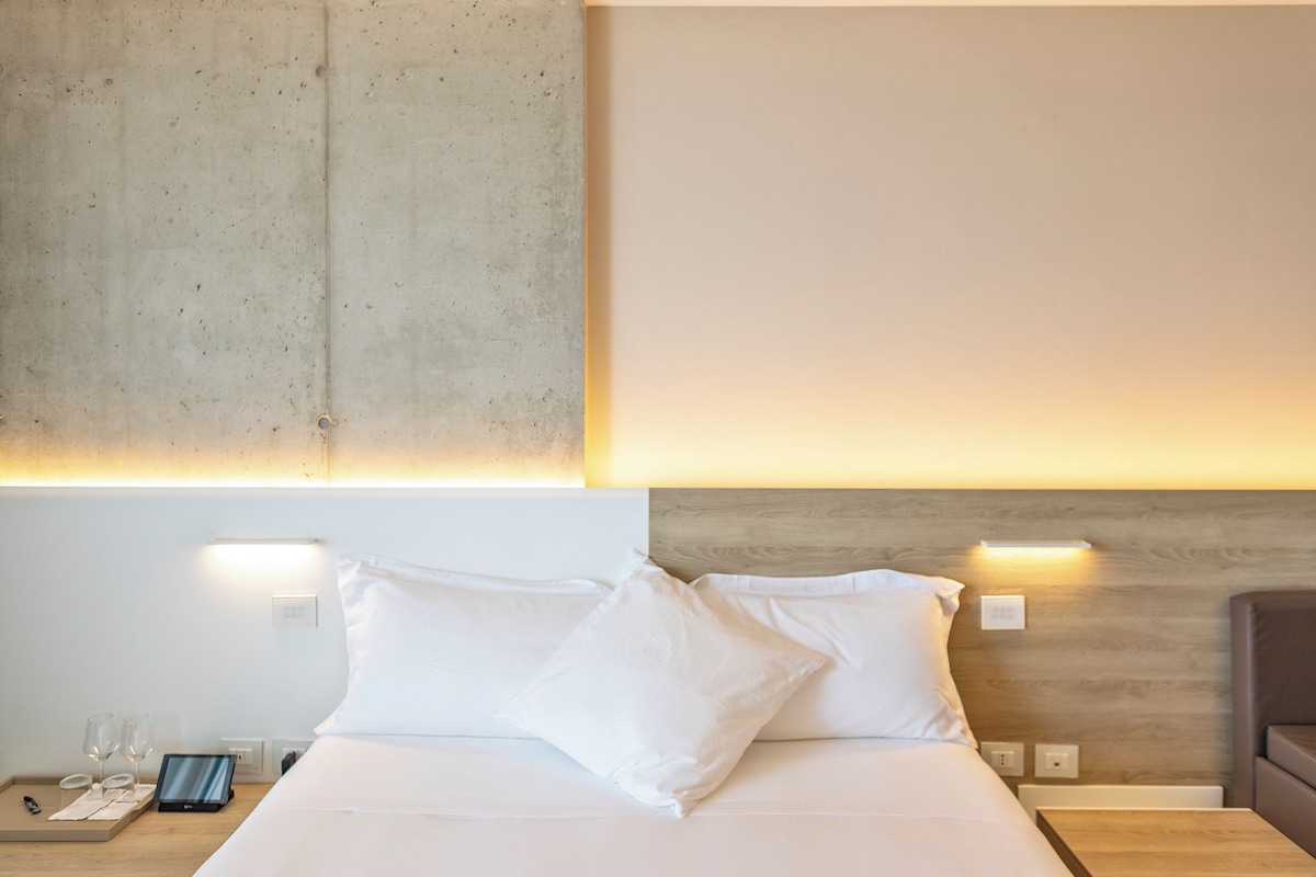 Sengetøy av topp kvalitet, dundyner, memory foam-senger og minibar
